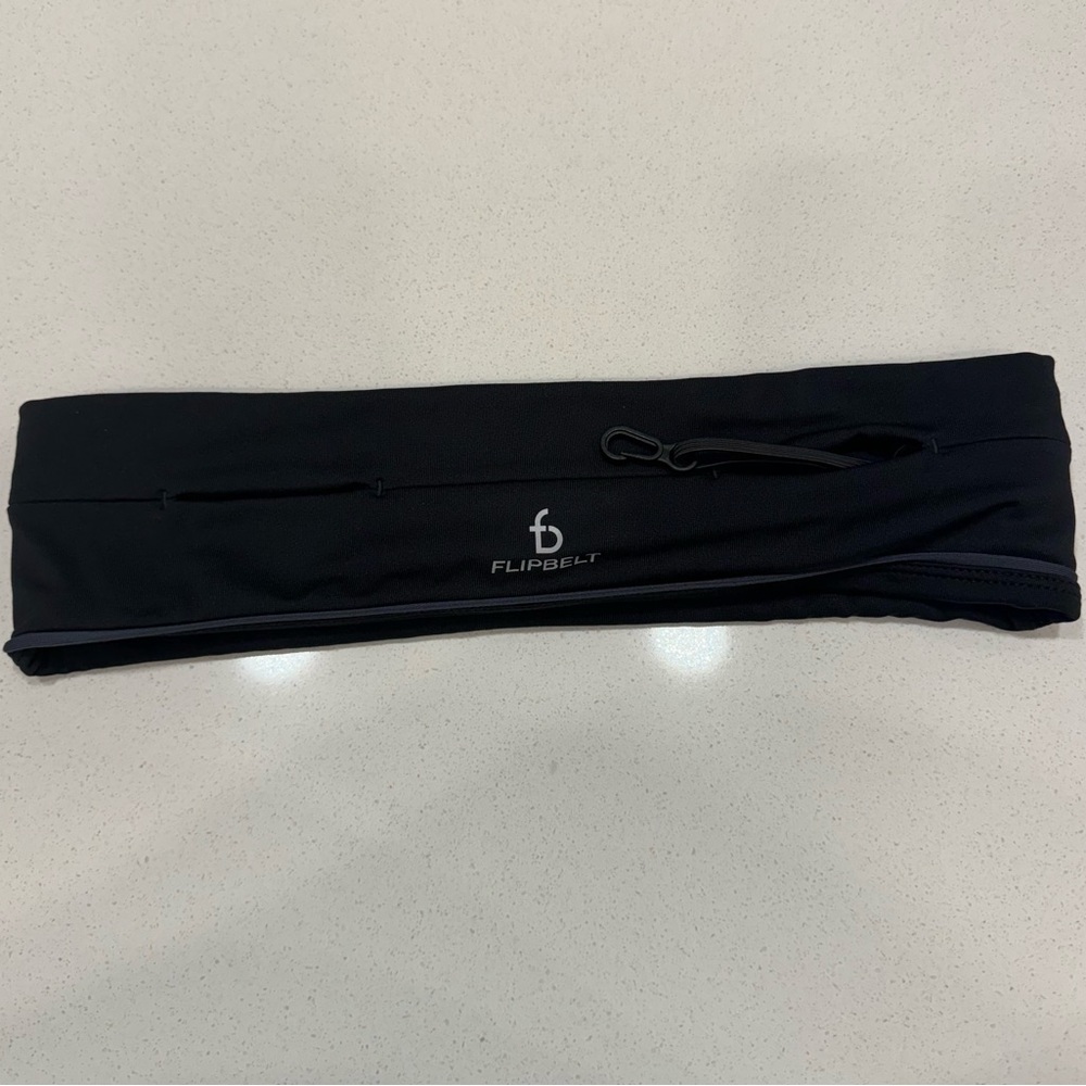 Flipbelt running beltgreat condition black size medium unisex men and women